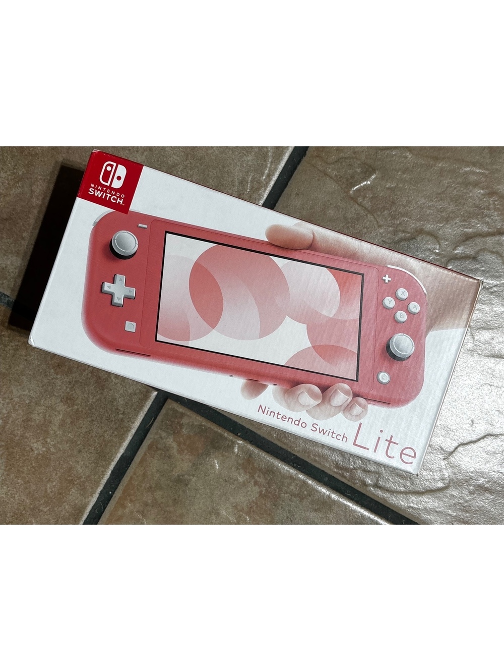 Nintendo Switch Lite Coral Handheld Console